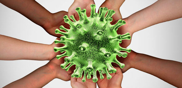covid-vaccine-research - Human Services Edu Diverse hands from multiple people joining together to hold a green virus model, representing collective response to a public health crisis