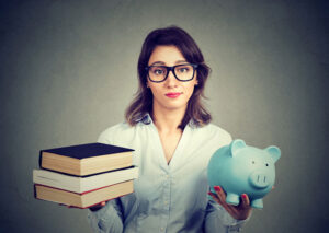 Student researching scholarship and grant funding options for a master of social work degree